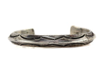 Orville Tsinnie (1943-2017) - Navajo - Sterling Silver Bracelet with Stamped Design c. 1980s, size 7