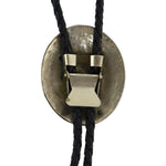 Willie Nezzie (b. 1950) - Navajo - Turquoise and Coral Chip Inlay and Silver and Leather Bolo Tie c. 1970-80s, 2" x 1.5" bolo